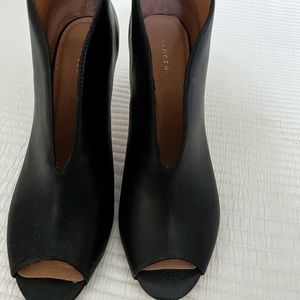 Halogen shoes/boots, open toe.  Very comfortable, but only worn in the house.